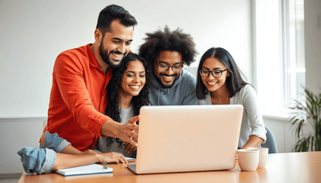 A diverse group of people gathered around a laptop, brainstorming ideas for online courses in a bright, modern setting with notebooks and coffee cups.